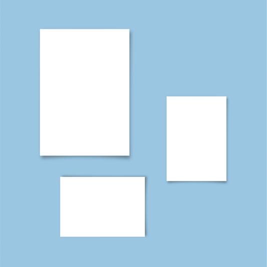 Three white rectangular cards on a light blue background